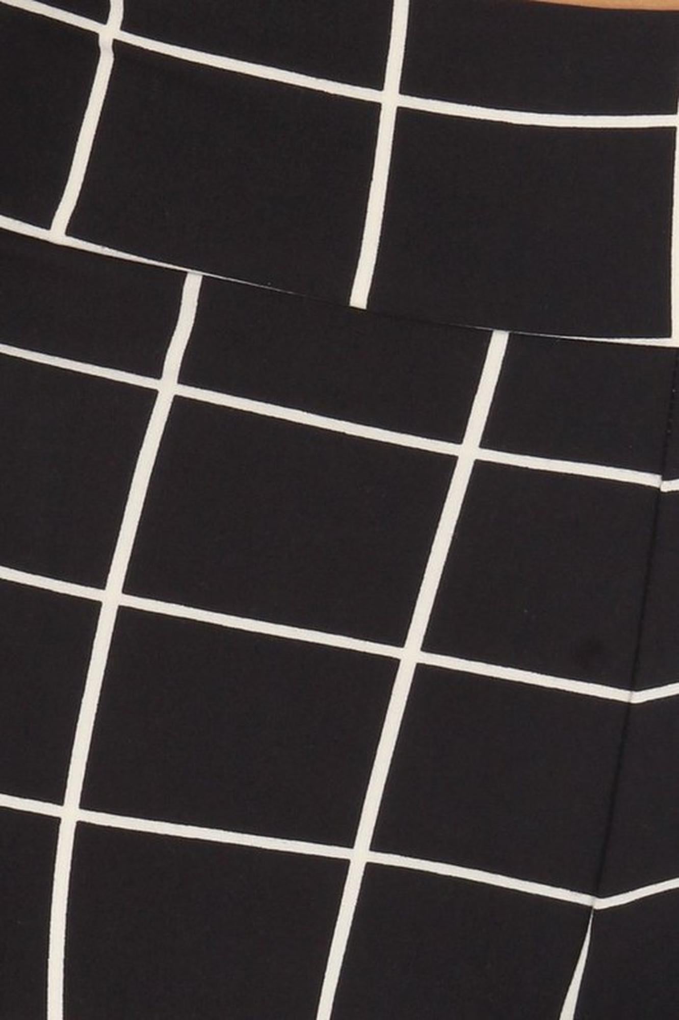 Buttery Smooth Black and White Grid Bell Bottom Leggings